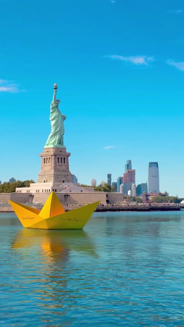 Veuve Clicquot Yellow Paper Boats Drift on River