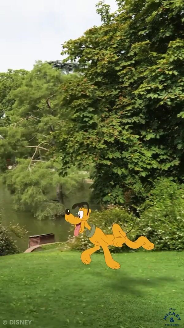 Disney Pluto Running Around the Park