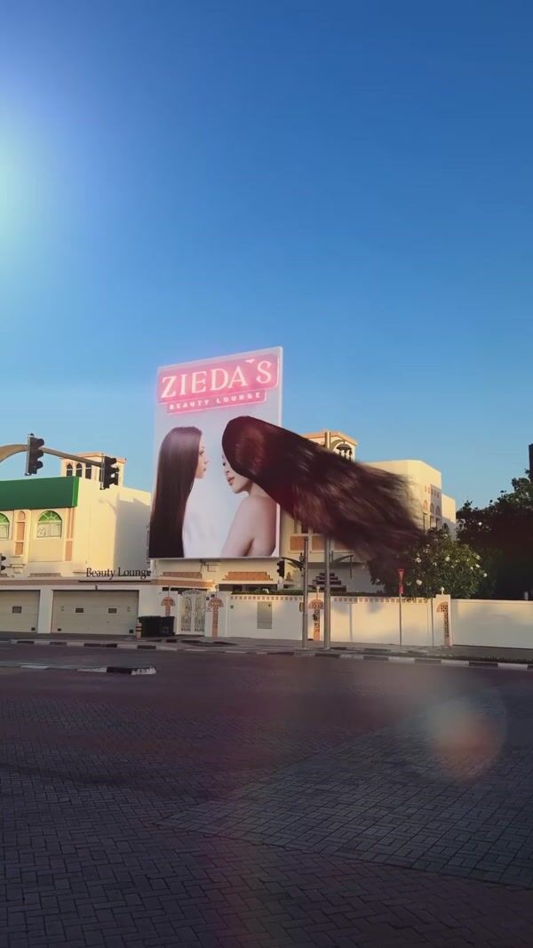 Zieda’s Clinic Flowing Hair Extending From Billboard