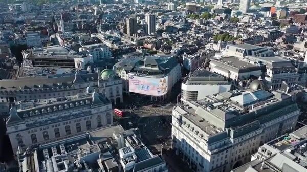 Persil Pod Rolls Off Screen Into Washing Machine