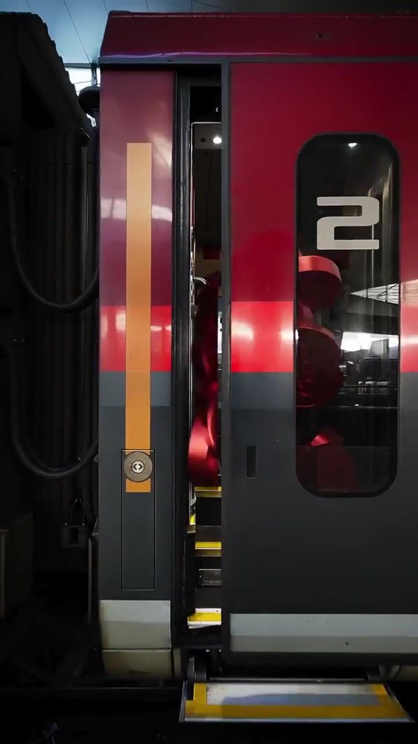 ÖBB Red Coins Spilling Out of Train