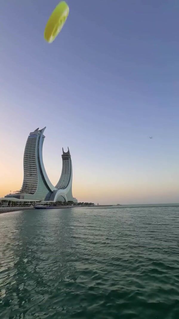 Gold Apple Giant Coin Lands on Katara Towers