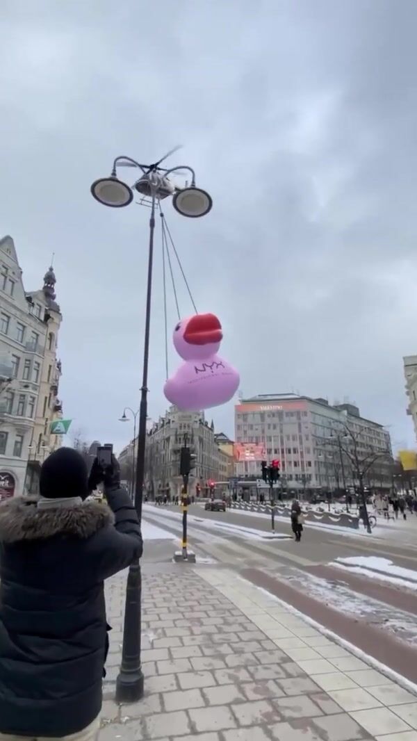 NYX Giant Pink Duck Dropped Off by Helicopter in Stockholm Streets