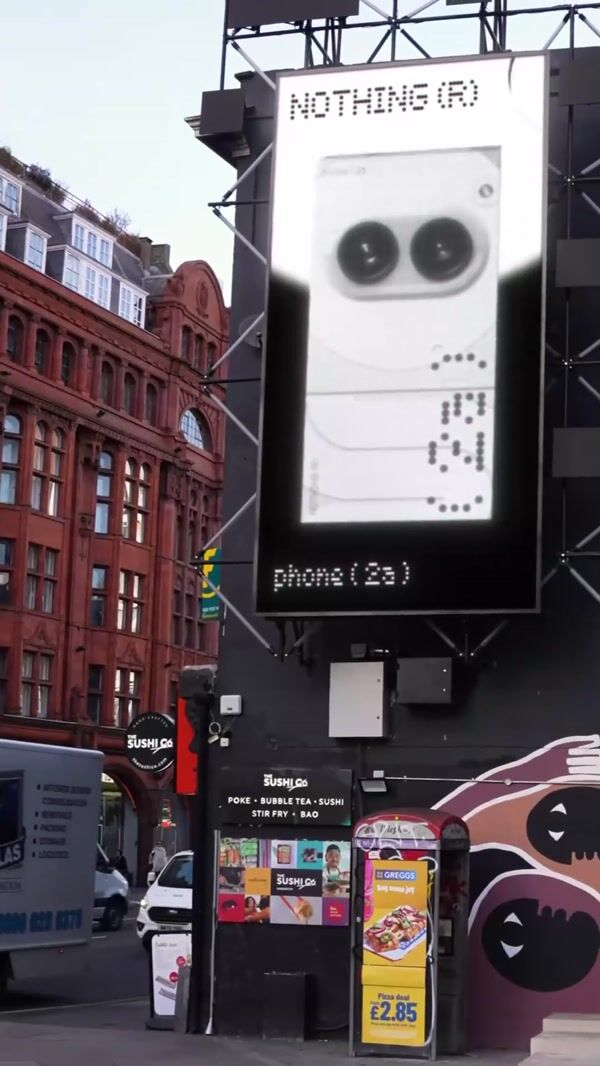 Nothing Crane Pulls Phone Box Out of Billboard