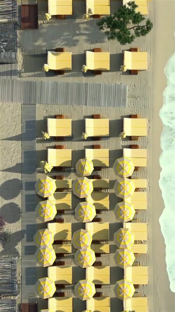 Jacquemus Yellow Umbrellas Unfurling at Beach