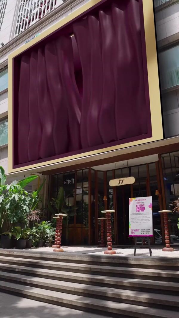 Nykaa Mannequin Sitting on Handbag Inside Screen
