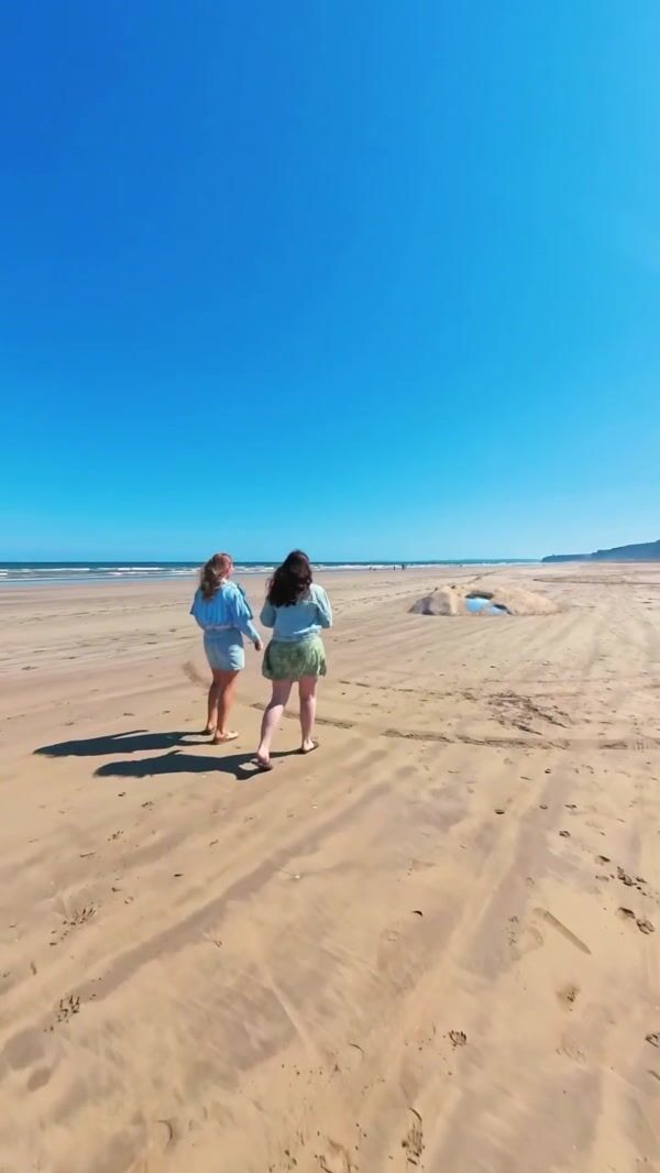 Primark Giant Bottle and Oasis Emerge from Sand