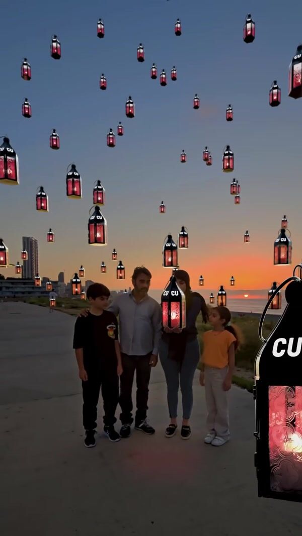 Cash United Padlock Lanterns Rise Into Night Sky