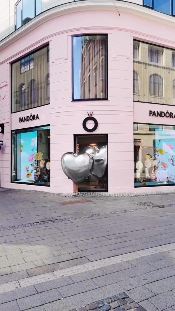Pandora Heart Charms Walking Out of Store