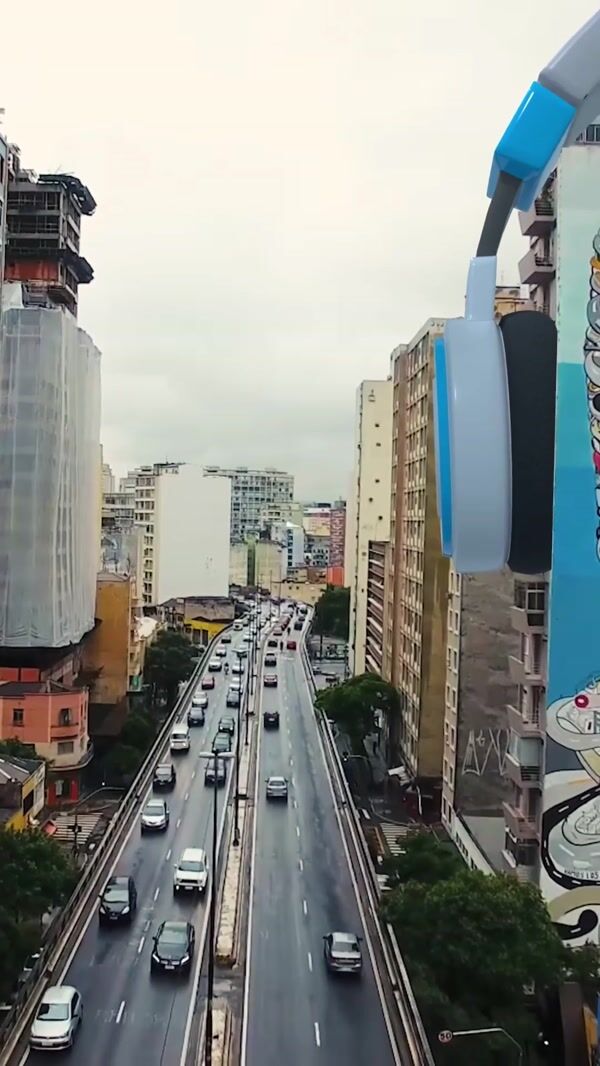 Prompt Filmes Headphone on Painted Building