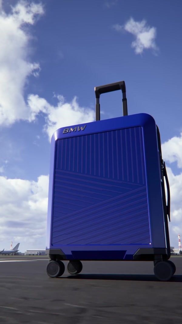 BMW Blue Suitcase Takes Flight at the Airport