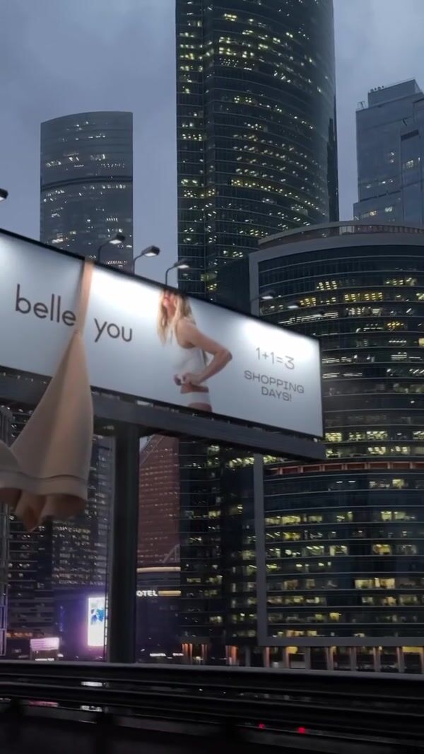 Belle You Giant Brassiere Hanging From Billboard