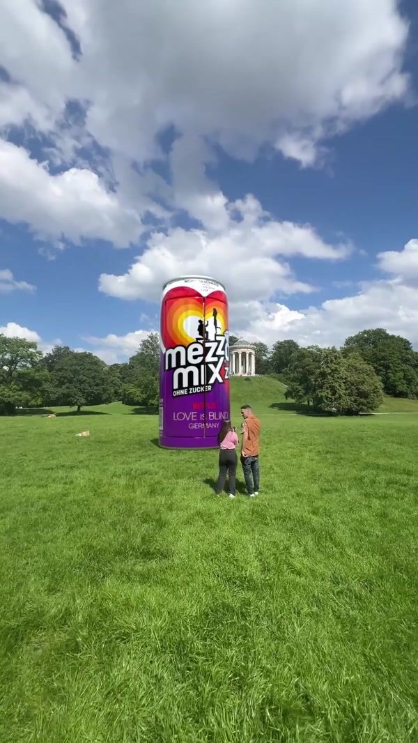 Mezzo Mix Giant Can on Grassy Field