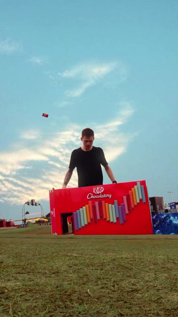 KitKat Man Surfs on Chocolate Bar