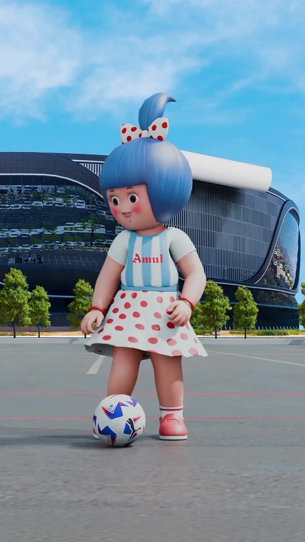 Amul Mascot Kicks Soccer Ball to Stadium