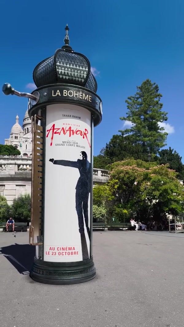Pathe Films Rolling Poster on Morris Column