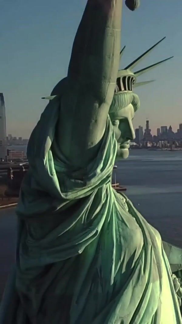 Adidas Statue of Liberty's Torch Emits Red Smoke