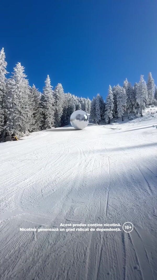 VELO Disco Ball Rolling Down Ski Slope