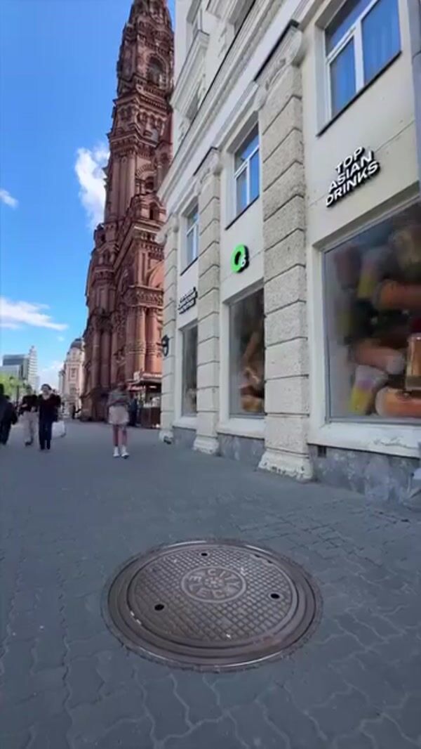 O5 Giant Bubble Tea Cup Rises from Manhole