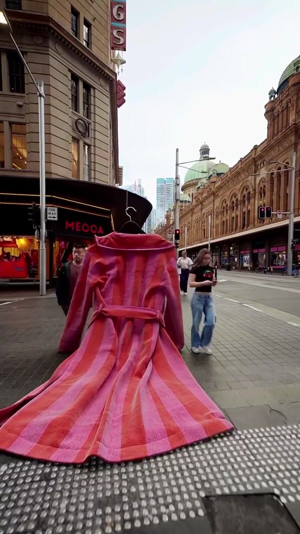 Hommey Robe on Hanger Walks the Street