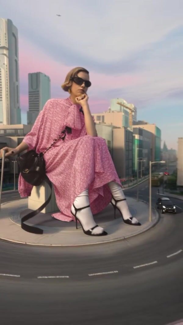 Balenciaga Giant Model Poses at Roundabout