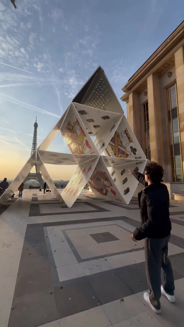 Asus Laptop Above Giant House of Cards
