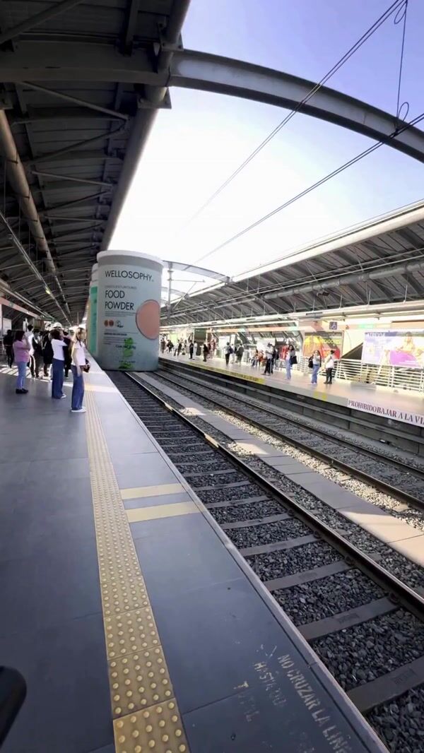 Oriflame Giant Bottles Glide on Train Tracks