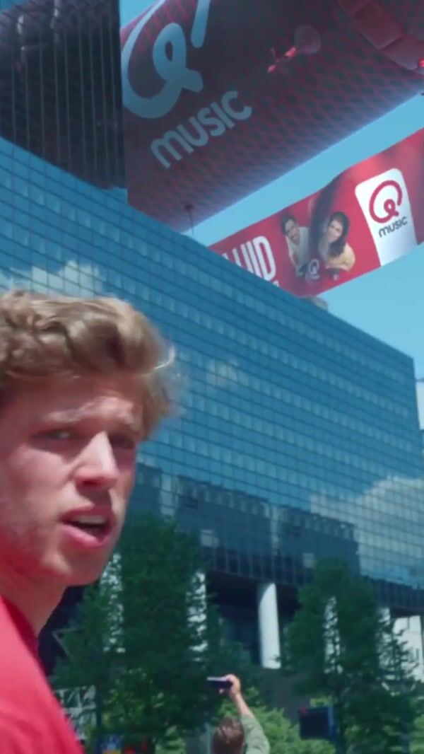 Qmusic Microphone Airship Flies Above Building