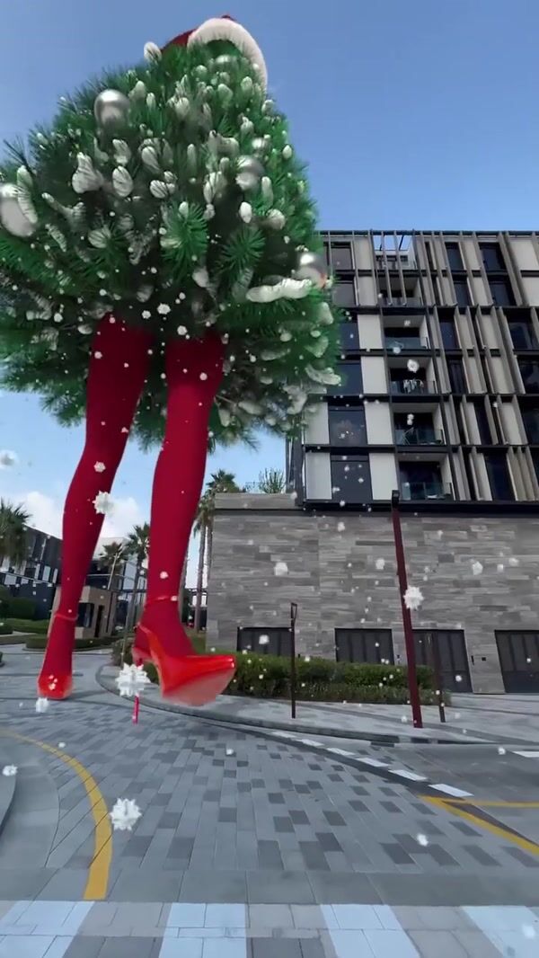 Elle Woman Dressed in Christmas Tree