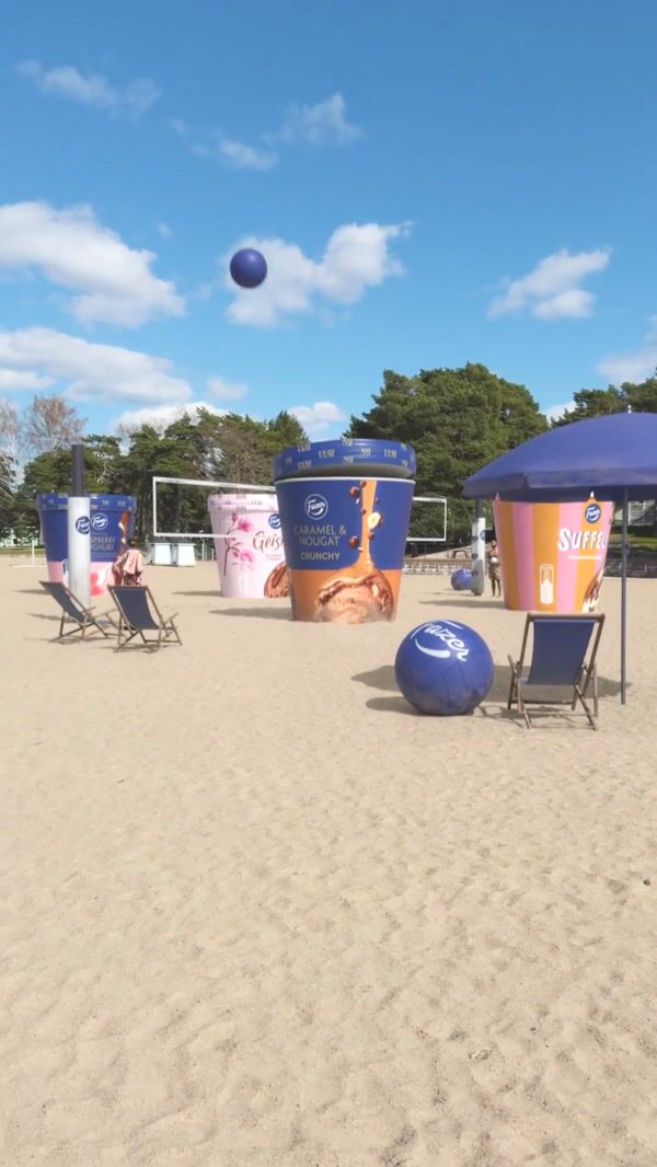 Fazer Giant Ice Cream Tubs Play Beach Volleyball