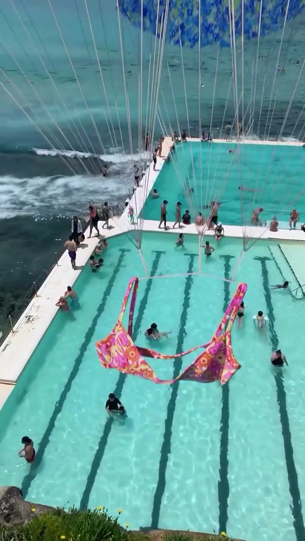 Kulani Kinis Bikinis Parachute Landing on Beach