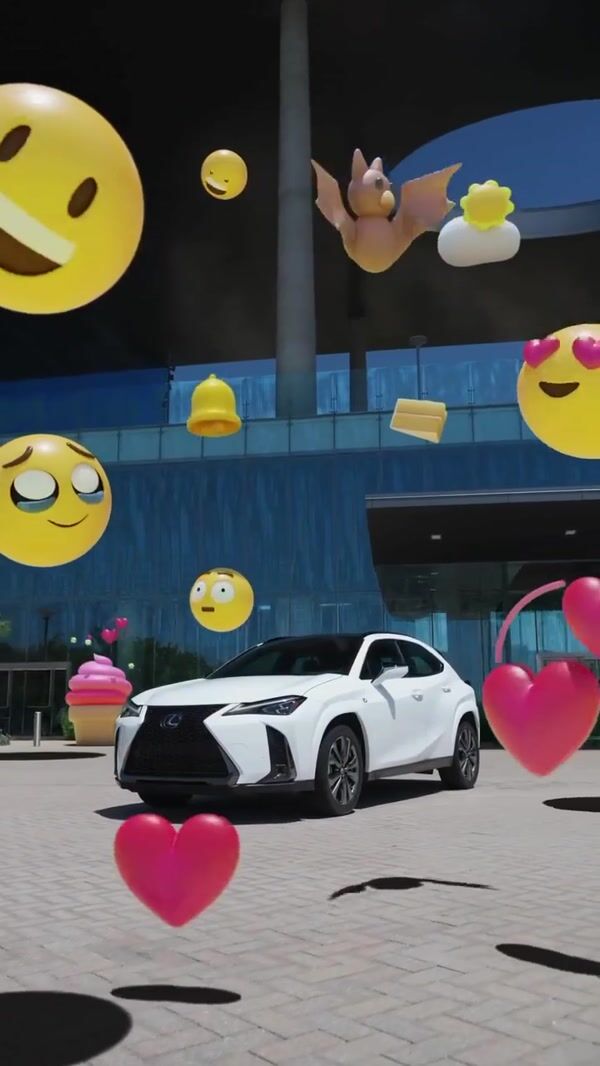 Lexus Car Surrounded with Floating Emojis