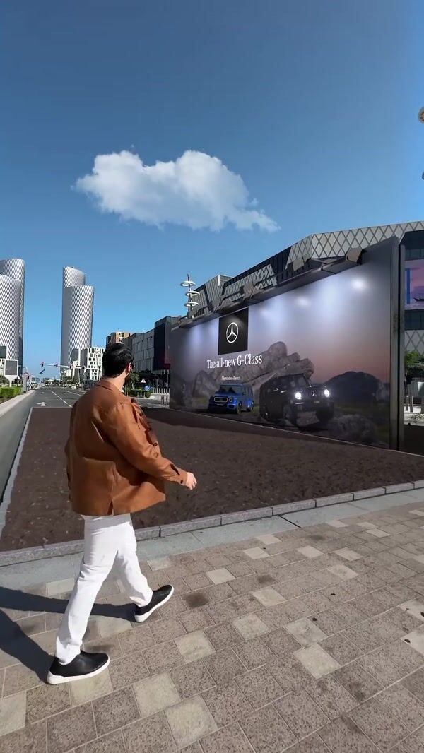 Mercedes-Benz Off-road Car Emerges from Billboard