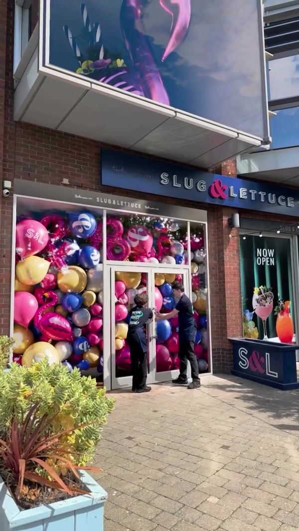 Slug & Lettuce Doors Open Releasing Balloons