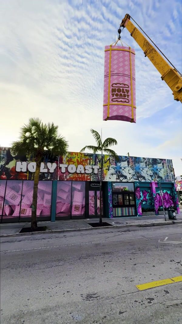 Holy Toast Giant Wrap Hanging from Crane