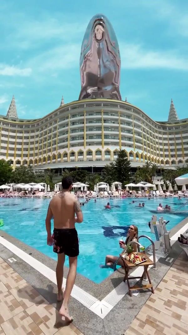 Delphin Hotels Giant Chrome Dolphin on Resort Facade