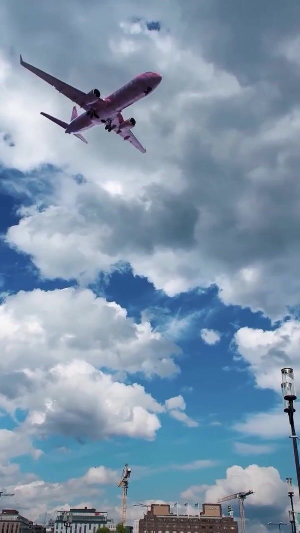 Burga Plane Flies Above Stockholm City Hall