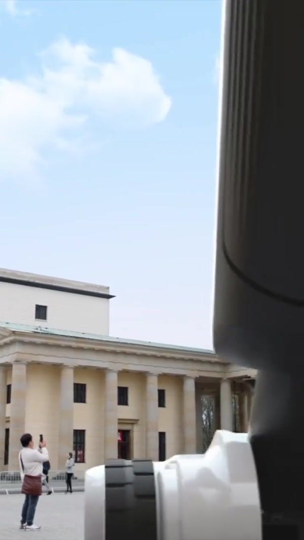Roborock Vacuum Folding Under Brandenburg Gate