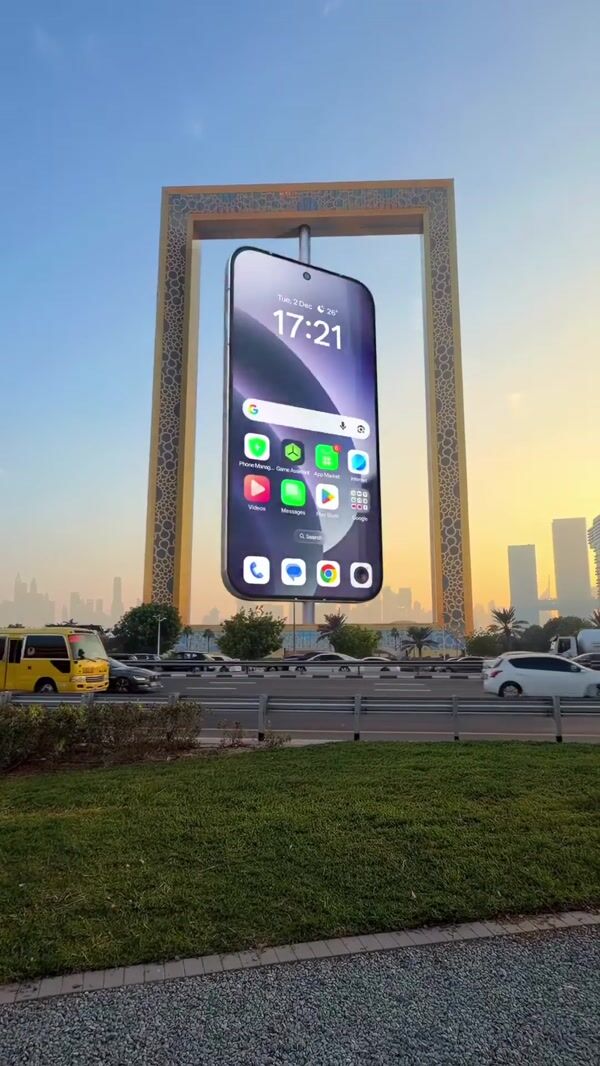 Oppo Giant Phone Hangs in Dubai Frame