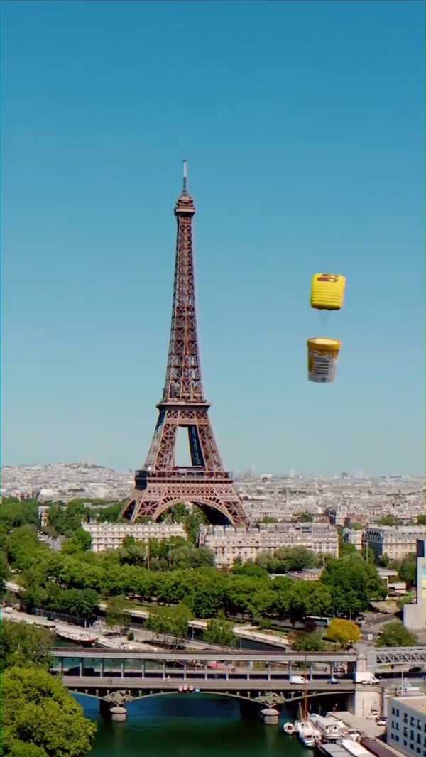 LEC Giant Ice Cream Tub Paraglides in Paris