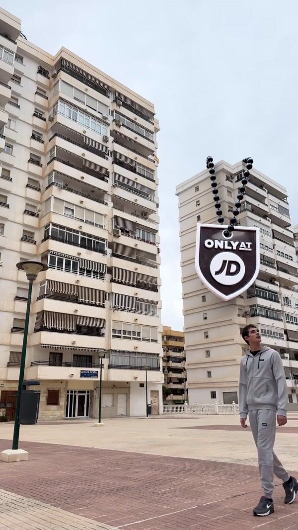 JD Sports Giant Shoe Lands Near Man