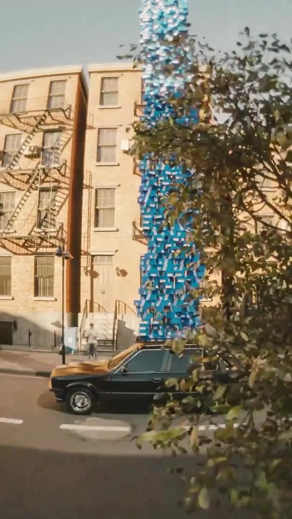 JD Sports Towering Shoeboxes on Car Roof