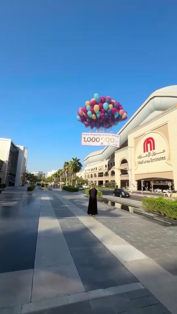 Mall of the Emirates Gift Check Carried by Balloons