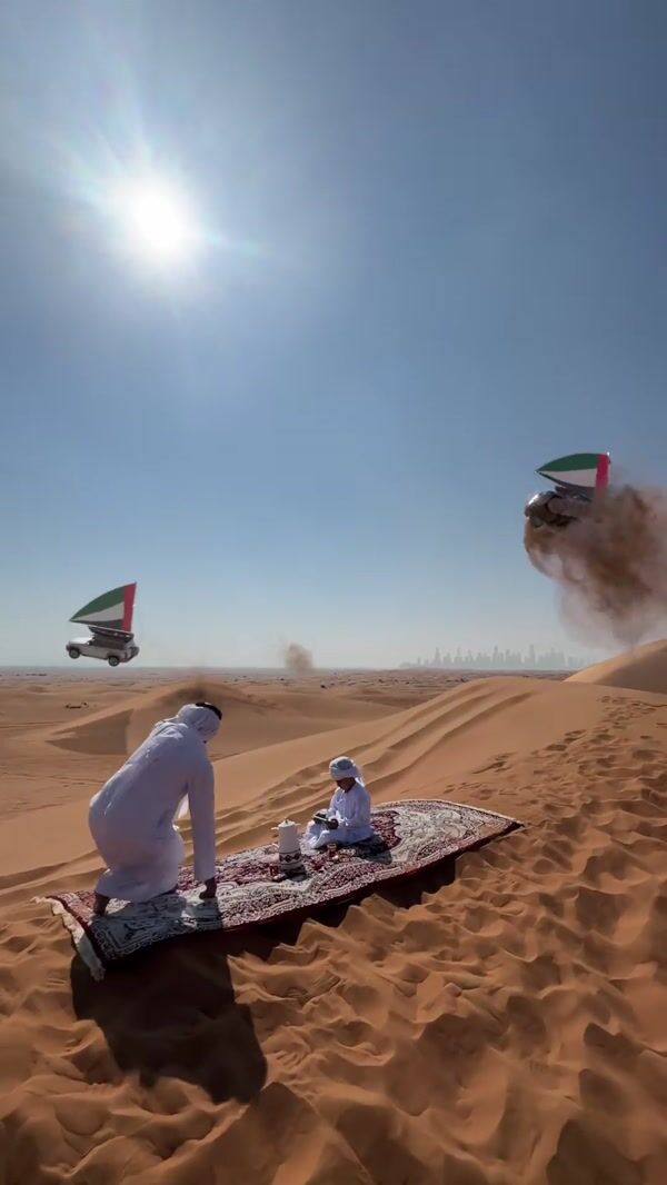 Nissan Cars with UAE Flags Drift on Dunes