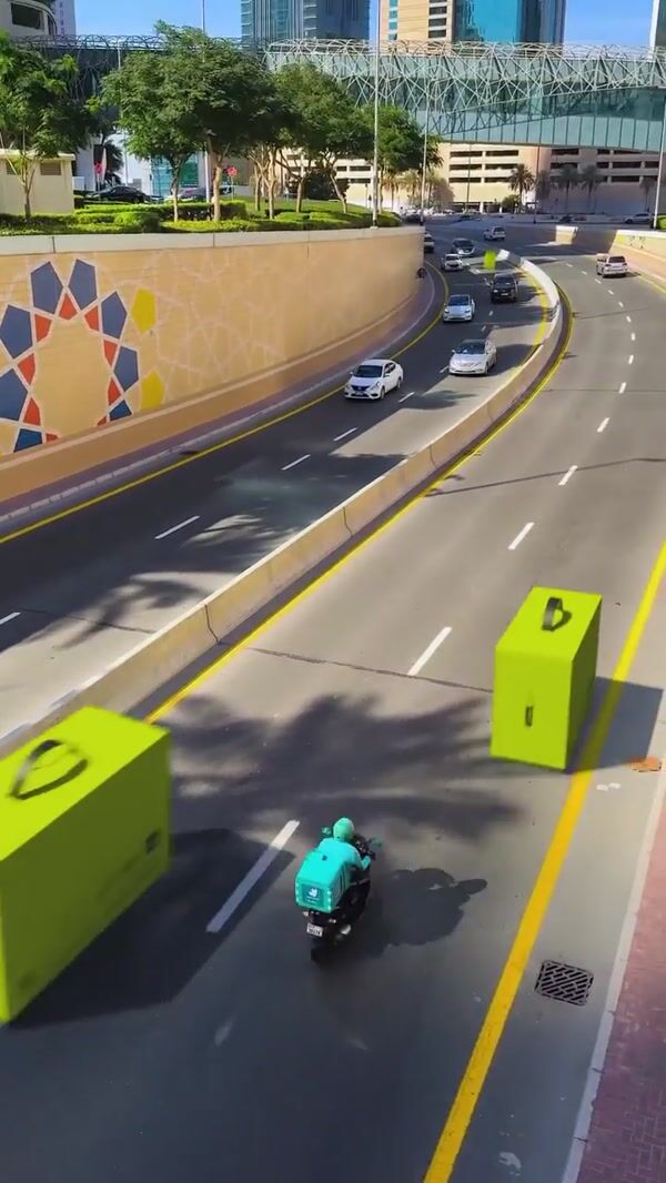 Gold Apple Giant Boxes Hit UAE Highway