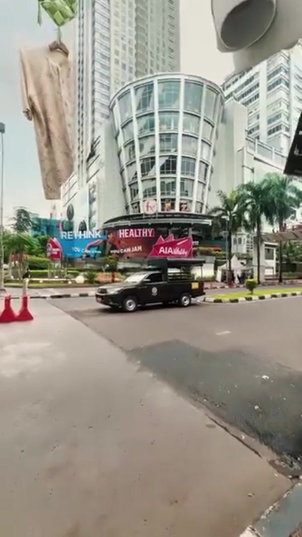 Manzone Shirts Hover Over Highway