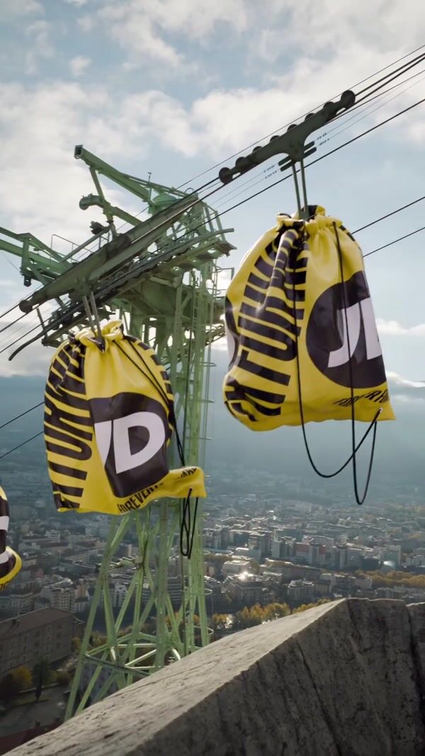 JD Sports Giant Bags Glide Across Cables in Grenoble