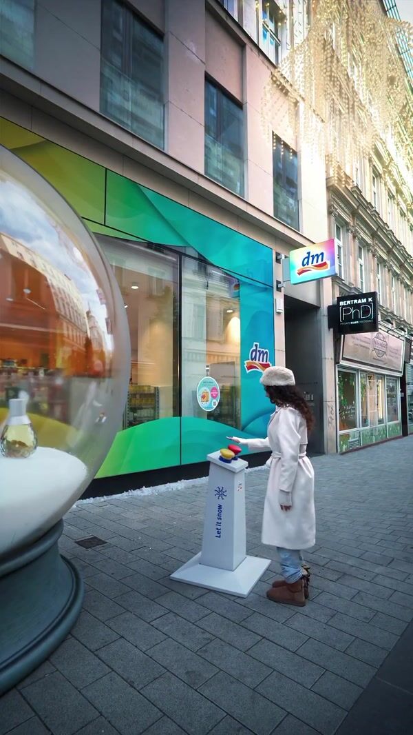DM Giant Snow Globe Perfume Installation