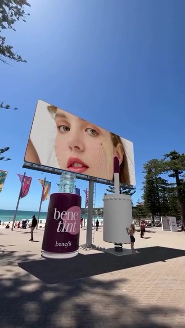 Benefit Lip Tint Touching Model's Cheek