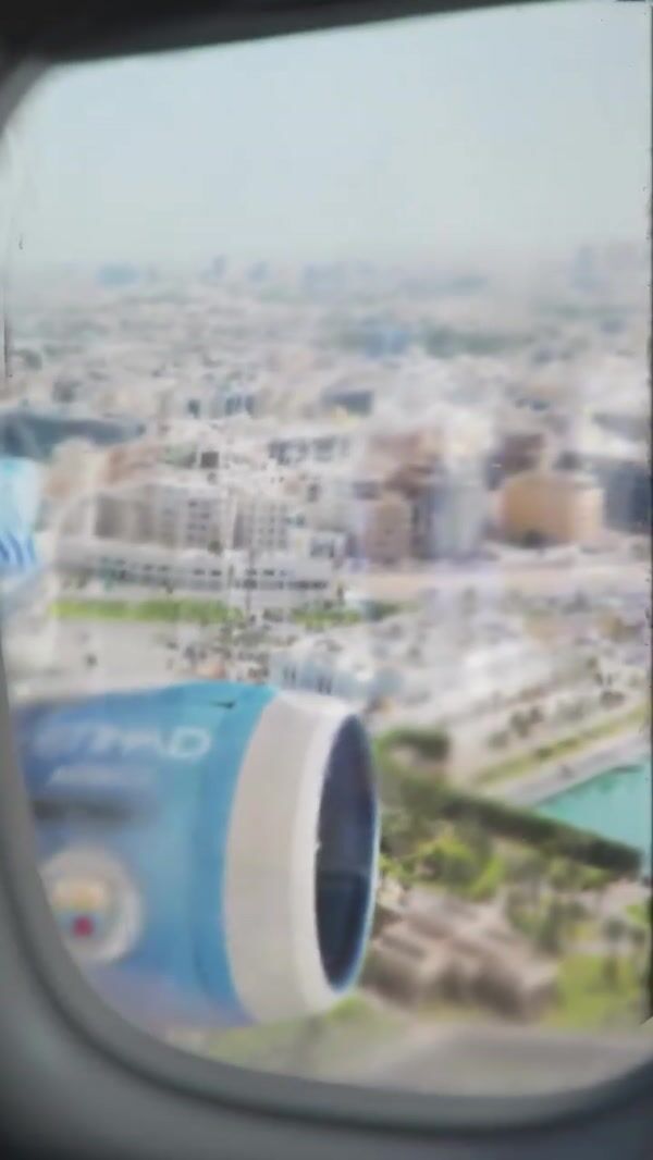 Manchester City Trophies on Airplane Wing